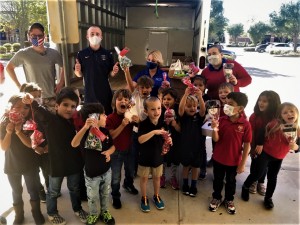 Preschool students donated handmade ornaments and cards to food pantry for their community service project.